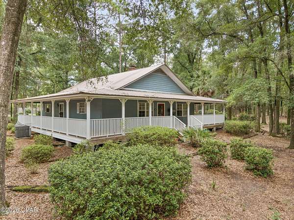5.22 Acres of Land with Home for Sale in Caryville, Florida