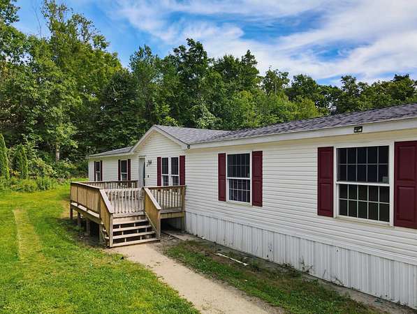 4.43 Acres of Land with Home for Sale in New Boston, New Hampshire