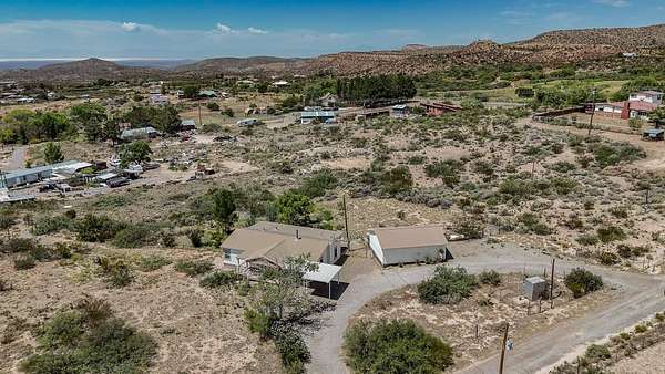 2.47 Acres of Land with Home for Sale in La Luz, New Mexico