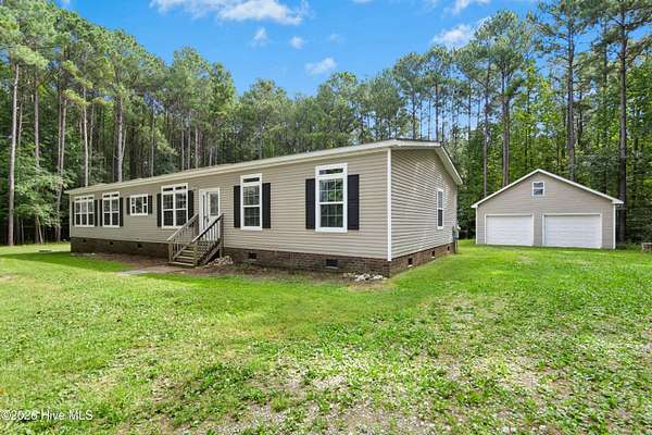 11.8 Acres of Recreational Land with Home for Sale in Lucama, North Carolina