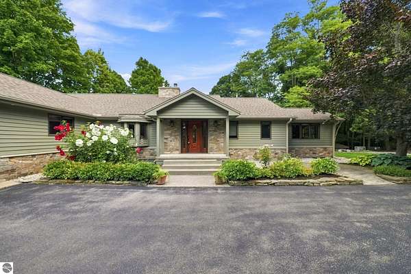 28.4 Acres of Land with Home for Sale in Williamsburg, Michigan