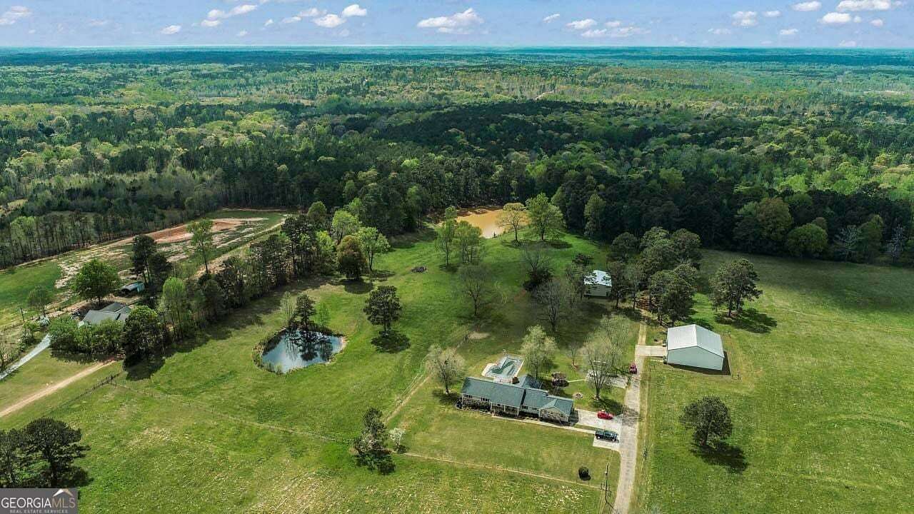 31.7 Acres of Agricultural Land with Home for Sale in Hampton, Georgia