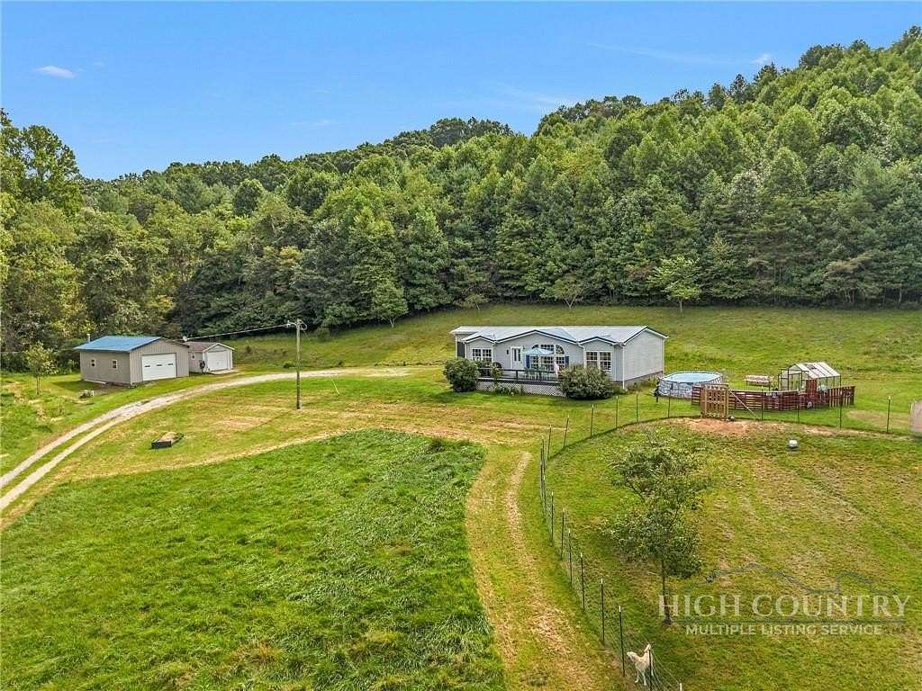 7 Acres of Land with Home for Sale in Crumpler, North Carolina