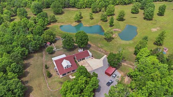 15.9 Acres of Recreational Land with Home for Sale in Paron, Arkansas