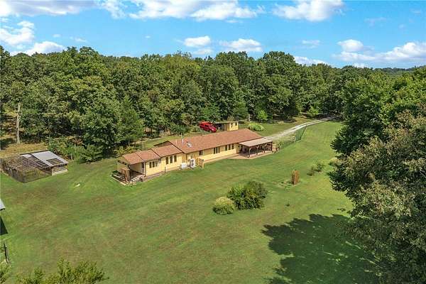 13.1 Acres of Land with Home for Sale in Lead Hill, Arkansas