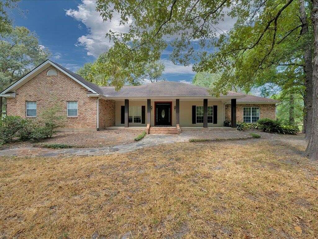 6.85 Acres of Land with Home for Sale in Lufkin, Texas