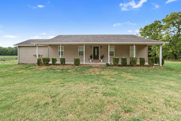 1.63 Acres of Land with Home for Sale in Castalian Springs, Tennessee