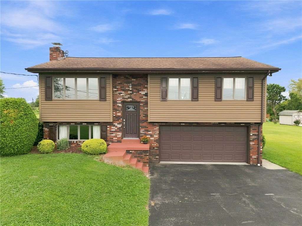 1.59 Acres of Land with Home for Sale in Scottdale, Pennsylvania