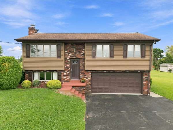 1.59 Acres of Land with Home for Sale in Scottdale, Pennsylvania