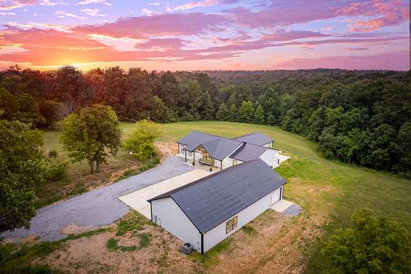 11.9 Acres of Land with Home for Sale in Cunningham, Tennessee