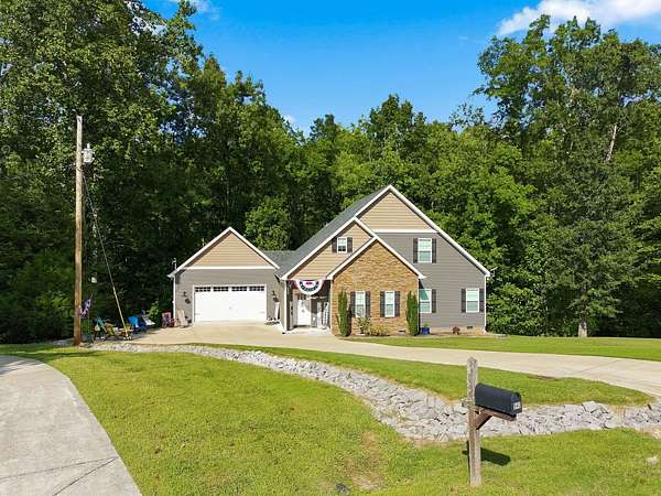 2 Acres of Land with Home for Sale in Burns, Tennessee