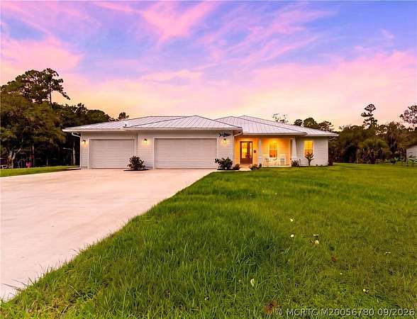 4.7 Acres of Land with Home for Sale in Palm City, Florida