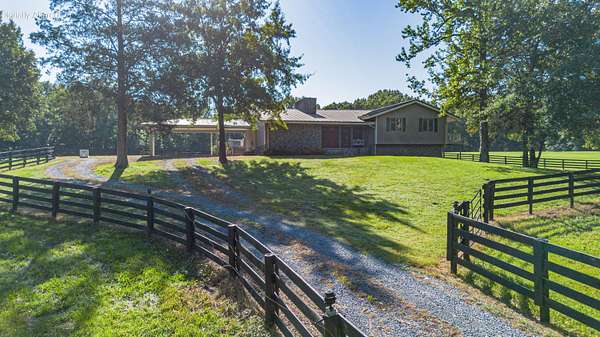 12.1 Acres of Land with Home for Sale in Almo, Kentucky