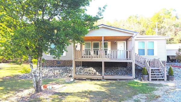 7 Acres of Land with Home for Sale in Mount Ida, Arkansas