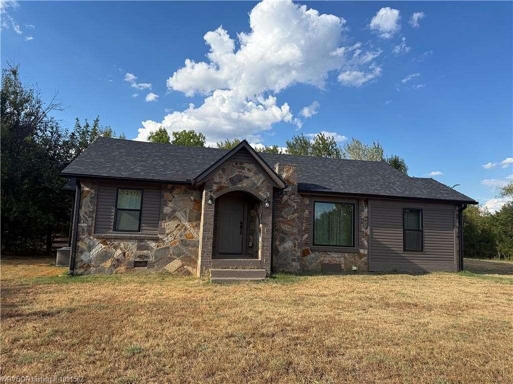 9.8 Acres of Land with Home for Sale in Hackett, Arkansas
