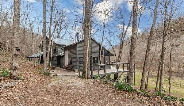 18.2 Acres of Recreational Land with Home for Sale in Seligman, Missouri