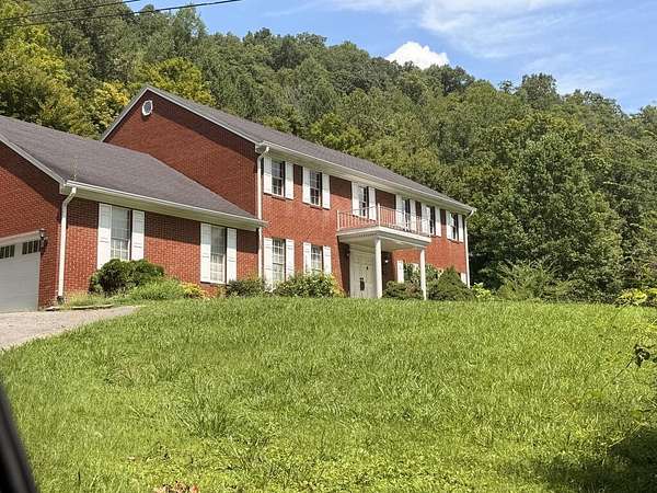6 Acres of Land with Home for Sale in Minnie, Kentucky