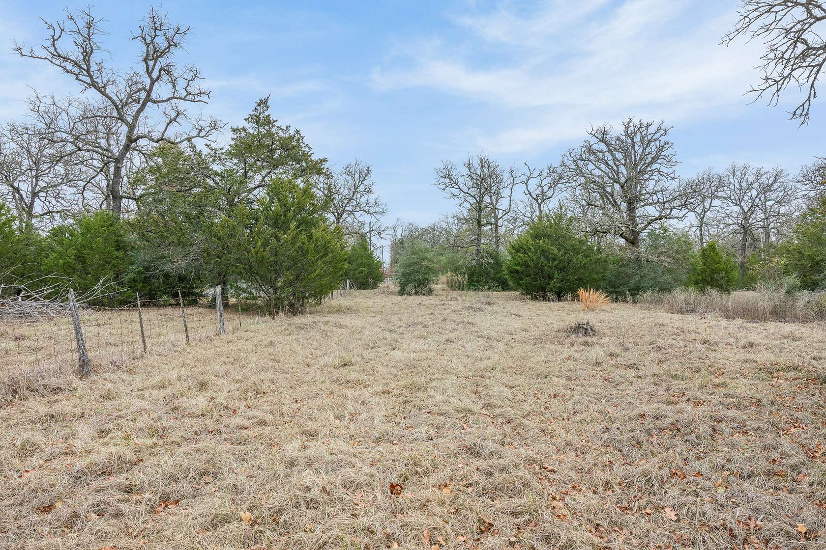 51.5 Acres of Recreational Land with Home for Sale in Paige, Texas