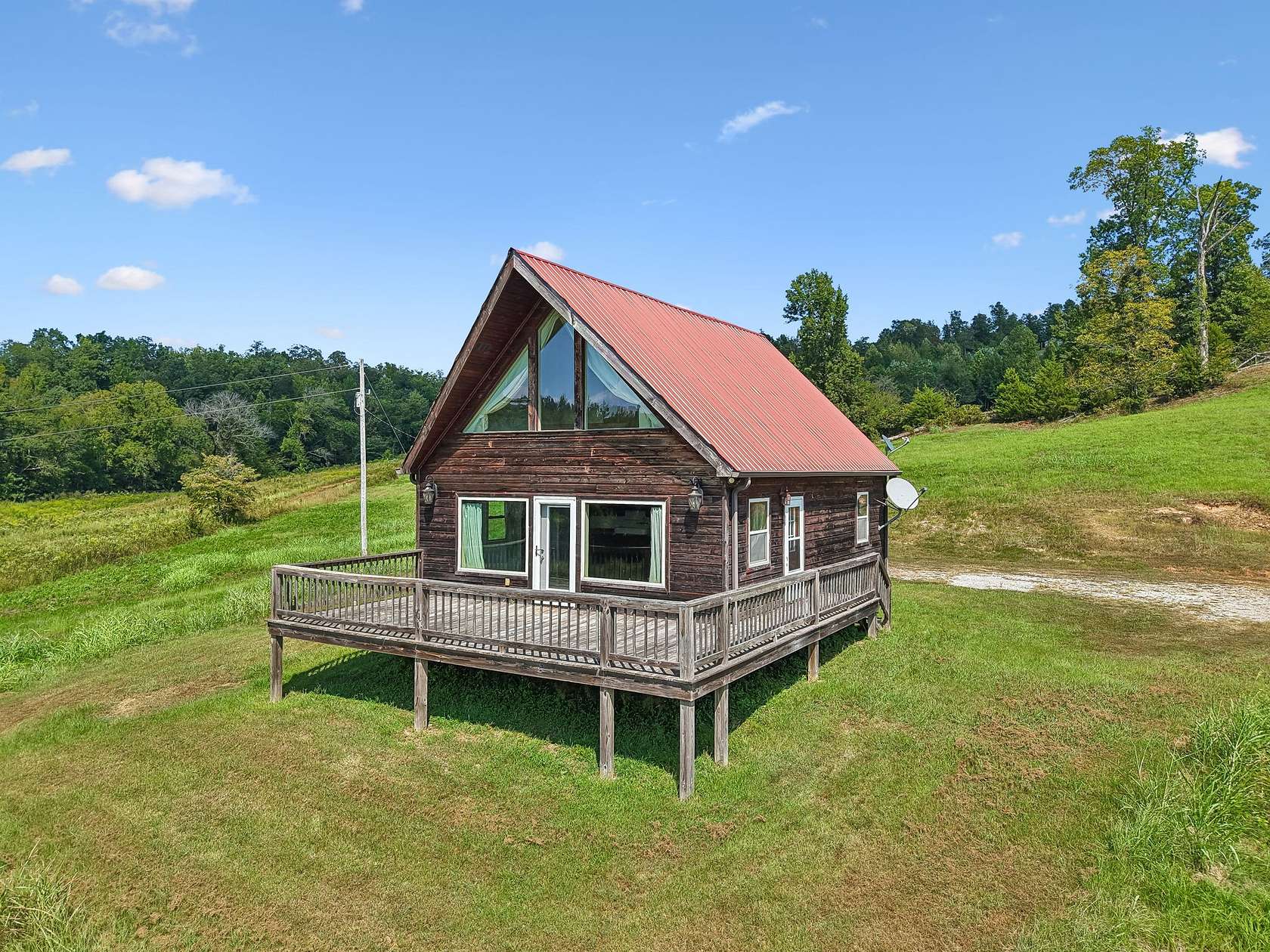 6.5 Acres of Land with Home for Sale in Linden, Tennessee