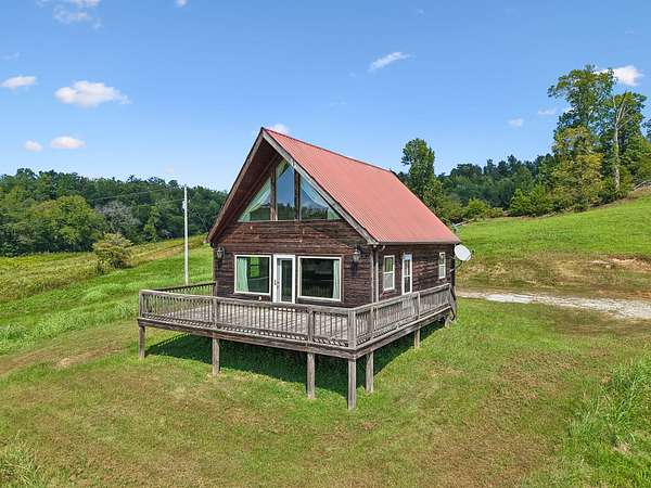 6.5 Acres of Land with Home for Sale in Linden, Tennessee