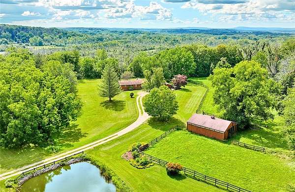 19 Acres of Land with Home for Sale in Williamson, New York
