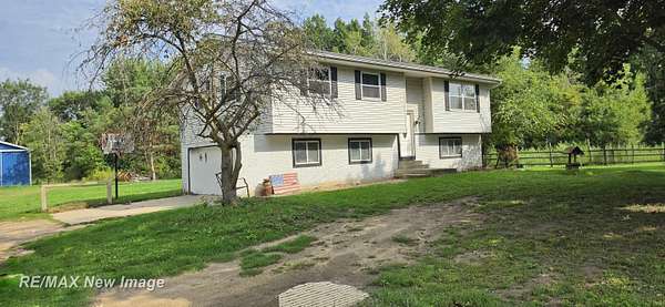 32.2 Acres of Land with Home for Sale in Chesaning, Michigan