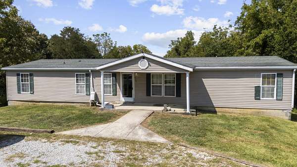 5.35 Acres of Land with Home for Sale in Corinth, Kentucky