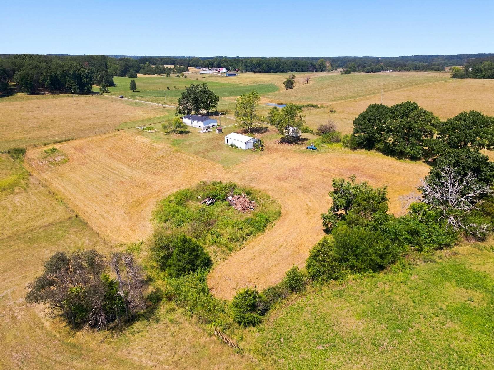 10 Acres of Land with Home for Sale in Crane, Missouri