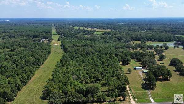 29.6 Acres of Recreational Land with Home for Sale in Maud, Texas