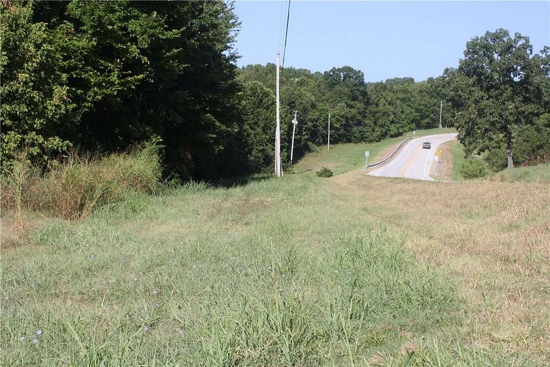 5.55 Acres of Land with Home for Sale in Summit, Arkansas