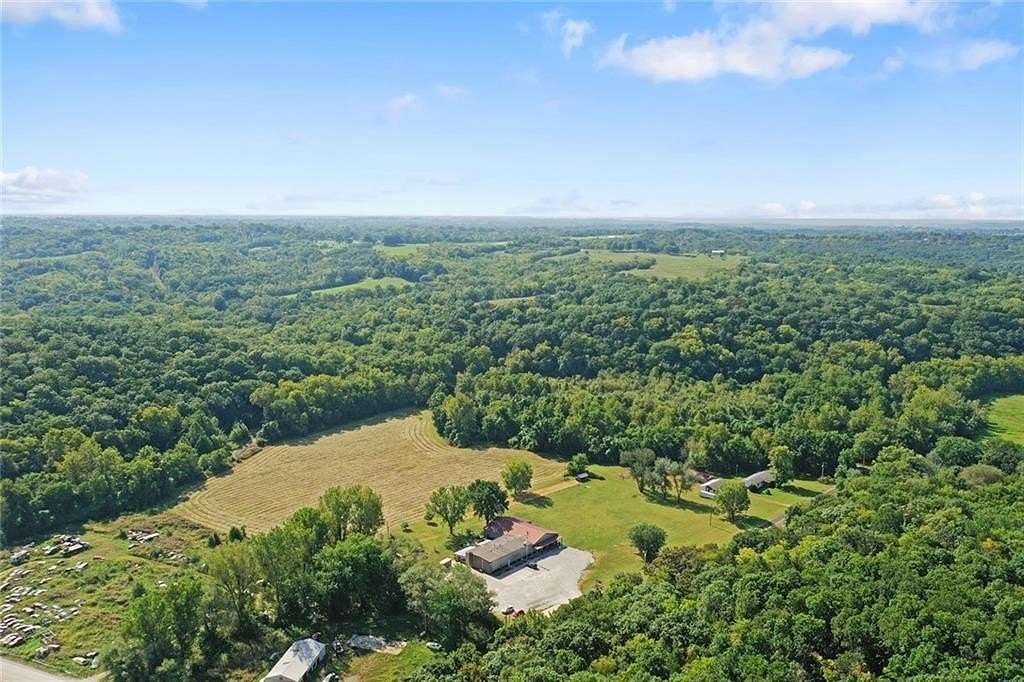 51.3 Acres of Recreational Land with Home for Sale in Excelsior Springs, Missouri