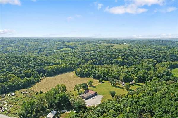 51.3 Acres of Recreational Land with Home for Sale in Excelsior Springs, Missouri