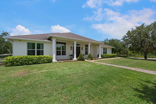5 Acres of Land with Home for Sale in Loxahatchee Groves, Florida