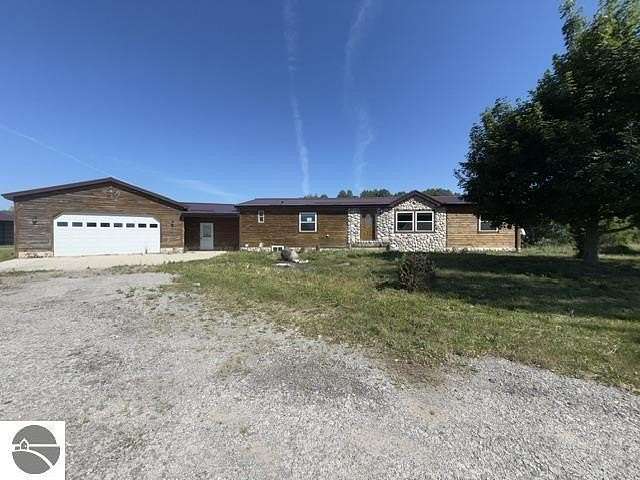 14 Acres of Land with Home for Sale in Scottville, Michigan