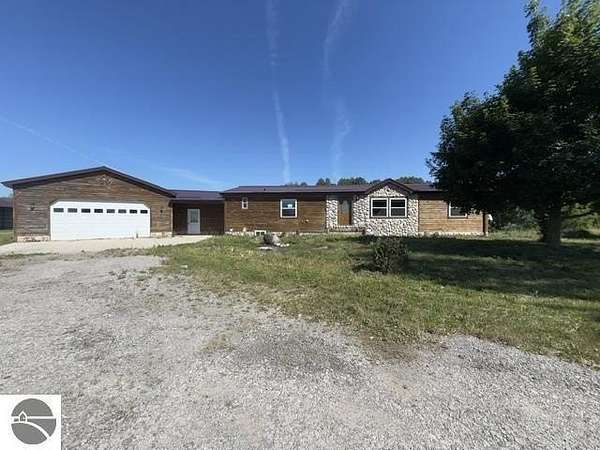 14 Acres of Land with Home for Sale in Scottville, Michigan