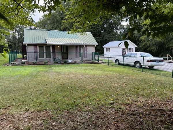 1.5 Acres of Land with Home for Auction in McMinnville, Tennessee
