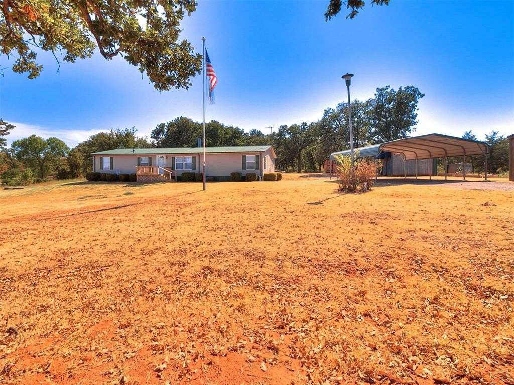5.18 Acres of Land with Home for Sale in Harrah, Oklahoma