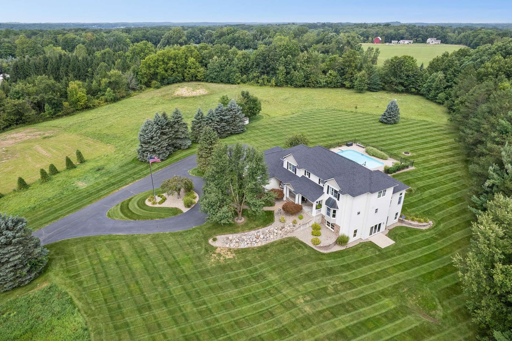 7.33 Acres of Land with Home for Sale in Alto, Michigan