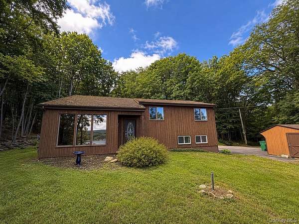 7 Acres of Land with Home for Sale in Holmes, New York
