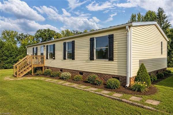 1.83 Acres of Land with Home for Sale in Linwood, North Carolina