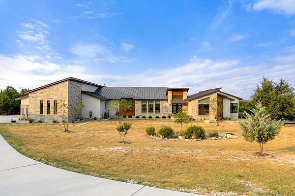 7.42 Acres of Land with Home for Sale in Blanco, Texas