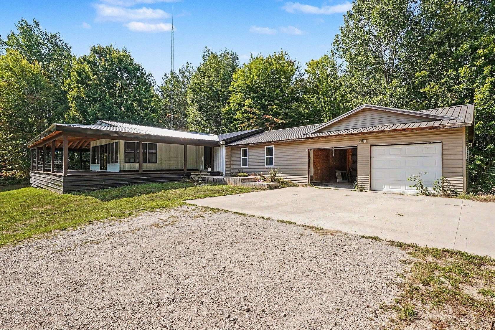 10 Acres of Recreational Land with Home for Sale in Coleman, Michigan
