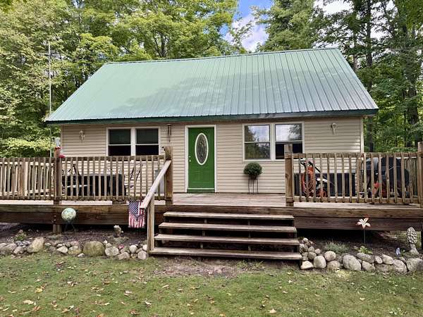 18.4 Acres of Recreational Land with Home for Sale in Elmira, Michigan