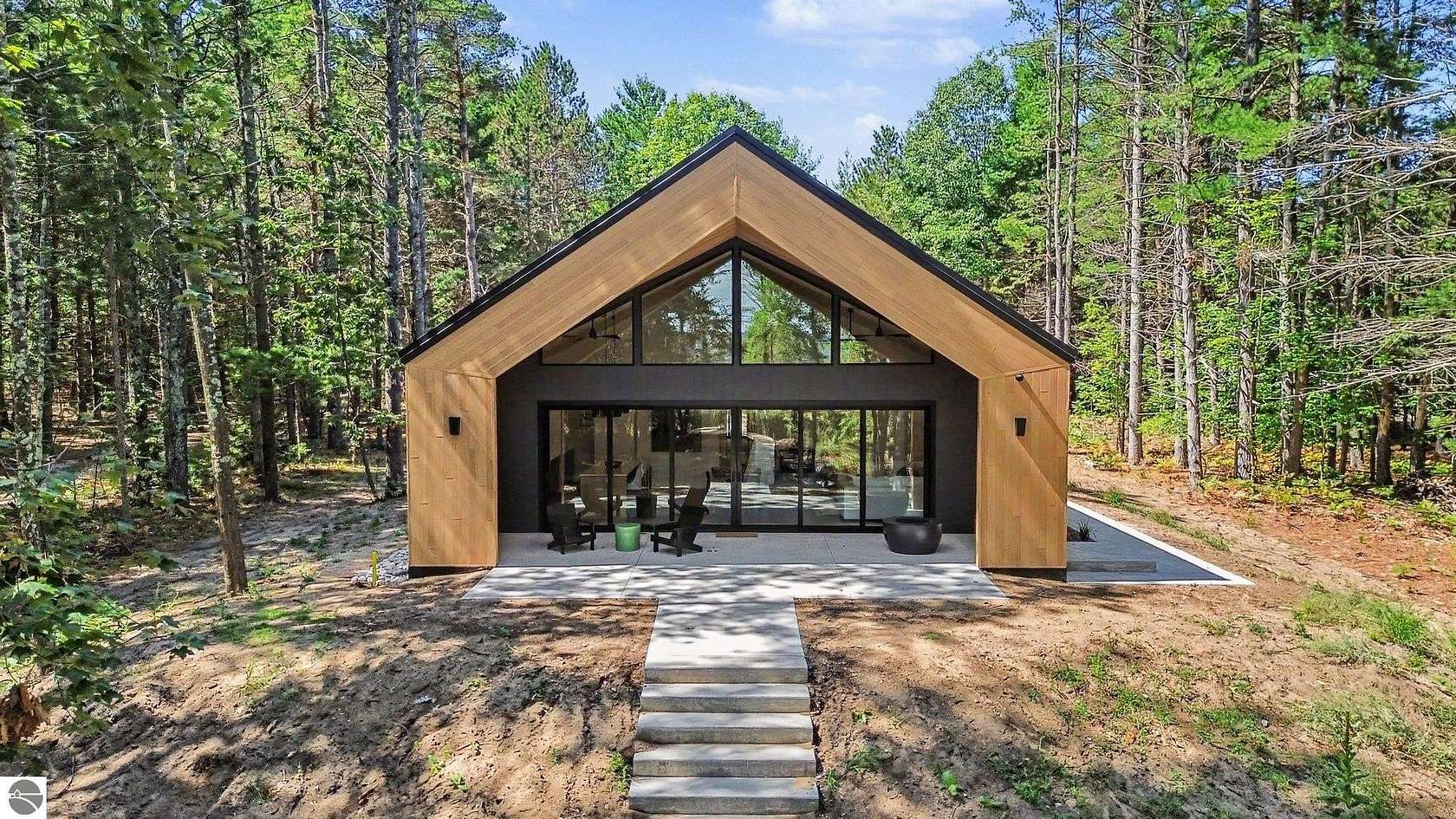 2.65 Acres of Land with Home for Sale in Kewadin, Michigan