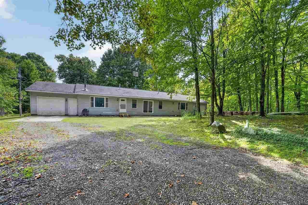 2 Acres of Land with Home for Sale in East Jordan, Michigan