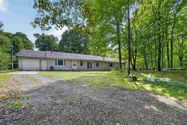 2 Acres of Land with Home for Sale in East Jordan, Michigan