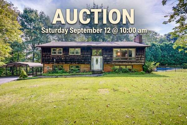 1.65 Acres of Land with Home for Auction in Bluff City, Tennessee