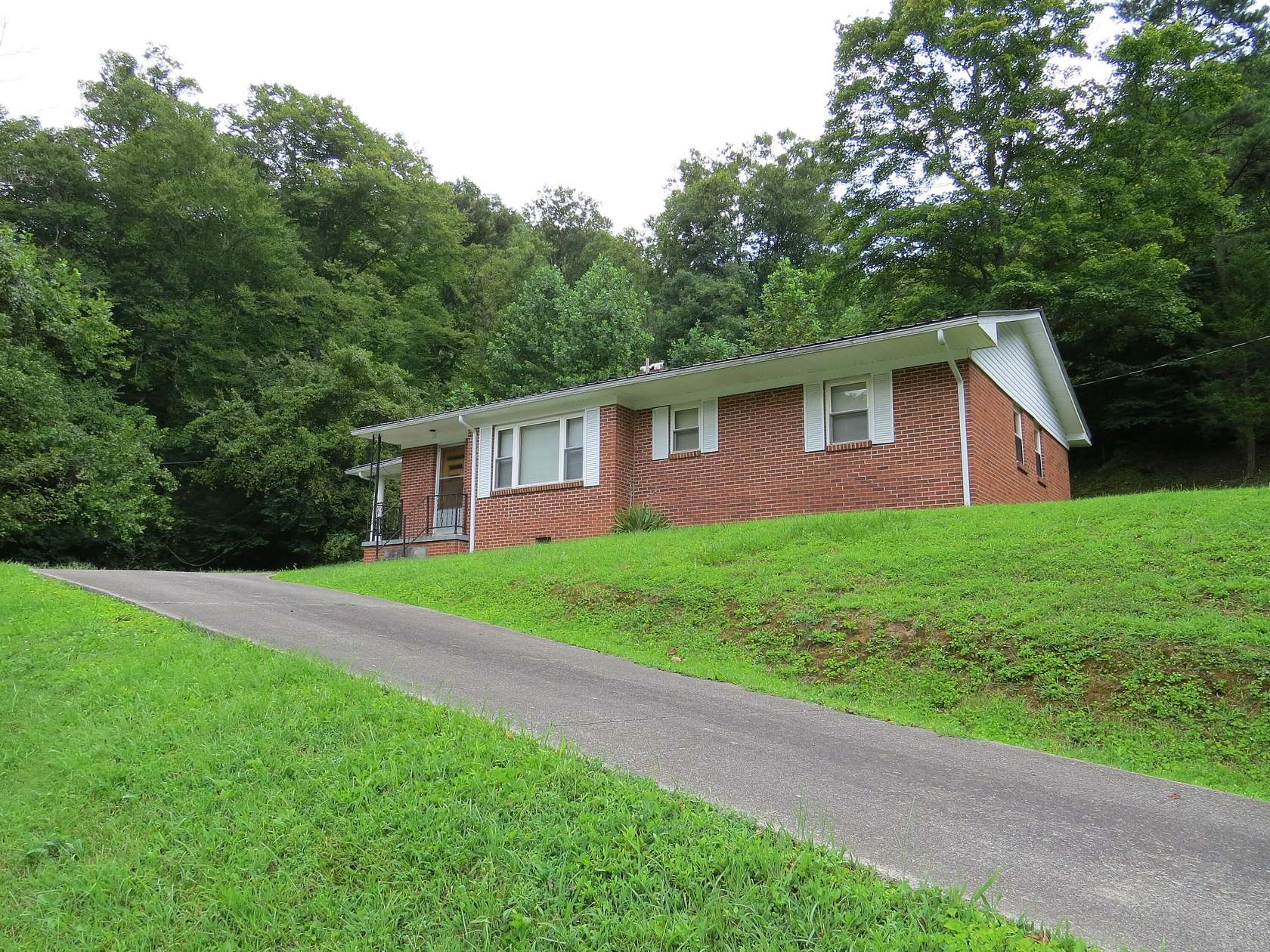 75 Acres of Recreational Land with Home for Sale in Flat Lick, Kentucky