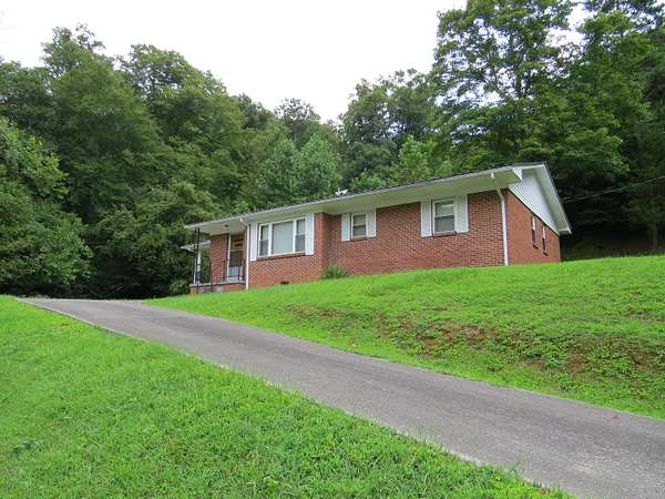 75 Acres of Recreational Land with Home for Sale in Flat Lick, Kentucky
