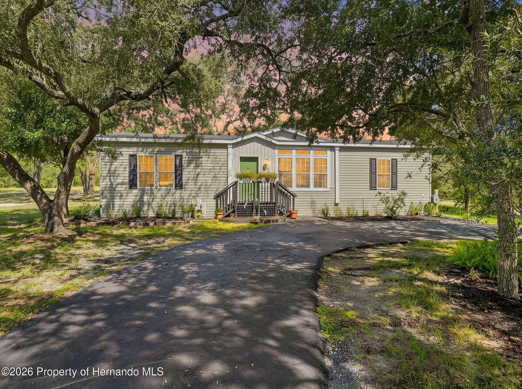 5.33 Acres of Land with Home for Sale in Spring Hill, Florida